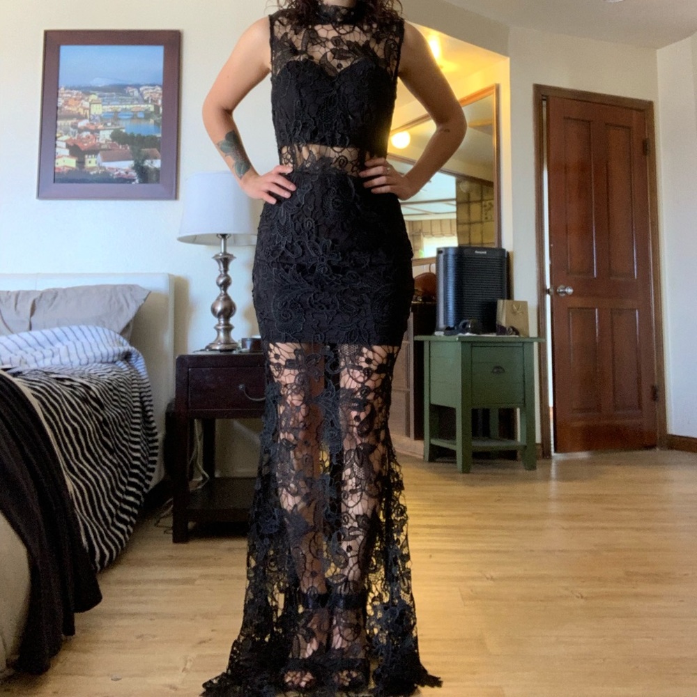 Fitted black lace dress